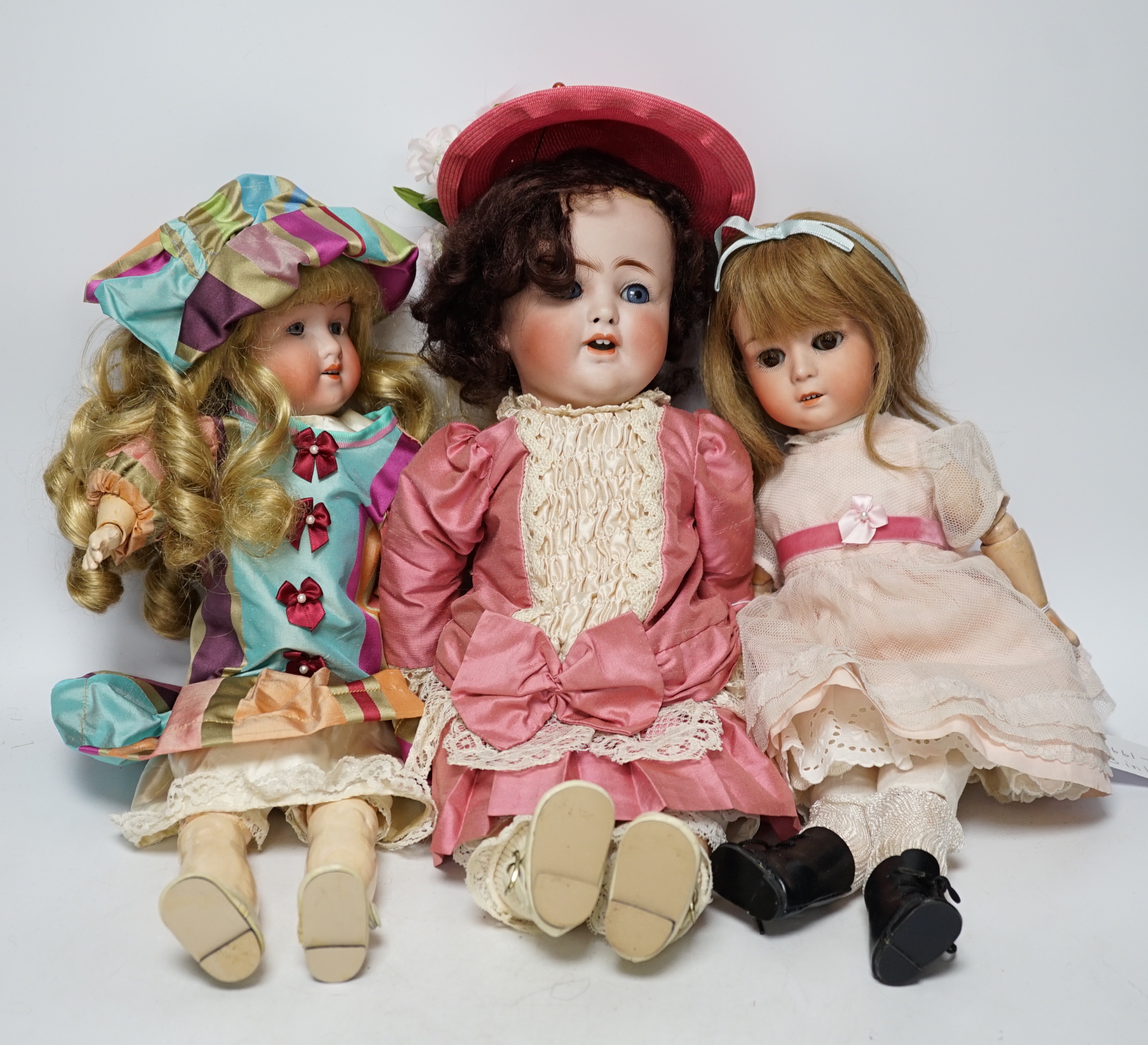 A Walter & Son 200 bisque doll, 38cm, an Alt Beck & Gottschalk 1361 character doll, 41cm, and a Gerbruder Heubach 8192 character doll, 40cm